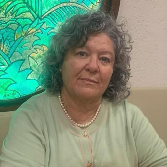 Dña. Milagrosa González Rodríguez.